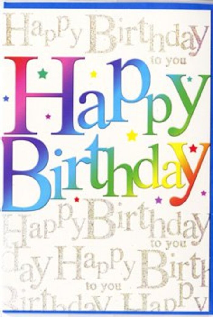 This birthday card looks as if it has been designed to sit proudly beside a vibrant bouquet, radiating cheer in the same way the flowers do. The central focus is the bold phrase Happy Birthday, written in large, rounded letters that stand tall and slightly overlapping, giving the impression of friendly balloons or painted wooden blocks. Each letter carries its own rich colour, forming a seamless rainbow that travels from deep red through fuchsia, violet, sapphire and teal, then into bright green and glowing yellow. The edges of the colours blur softly into each other, creating a smooth gradient that feels almost hand-blended, like petals carefully shaded by an artist. Behind this joyful statement, the background is covered with repeated lines of Happy Birthday to you in slender, flowing gold script. The script loops and curls gracefully, running diagonally across the card and creating a soft, musical pattern, as though the phrase is being gently sung in the distance. The golden lettering has a subtle shimmer, giving off little flashes of light that evoke tiny fairy lights twinkling in a Brockley back garden on a summer evening. The interplay between the solid, colourful main text and the delicate golden backdrop is striking yet harmonious, never feeling busy or overwhelming. Instead, it comes across as carefully composed, like a thoughtfully arranged display in a local Brockley florist window. This is the sort of birthday card you might choose for a friend celebrating in a café by Brockley station or at home near Ladywell Fields, where the design alone expresses excitement, affection and the sense that their special day truly matters.