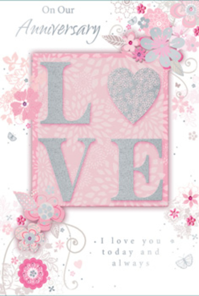Shown in close detail, this anniversary card radiates a warm, sunlit calm, much like a peaceful afternoon spent in a Brockley garden surrounded by quietly blooming flowers. The central motif is the word LOVE, printed in a refined typeface and overlaid with frosted glitter that creates a gently raised, tactile surface. When light falls across it, the letters sparkle with a delicate sheen, echoing the way fine dew catches on rose petals in the morning. Around this central word, wispy, hand-drawn blossoms and soft floral sprays curl and drift towards the edges of the card, their hues blending from blush pink to lilac and creamy ivory. Each petal and leaf is traced with fine lines and subtle shading, giving the illustration a sketchbook quality, as though a local Brockley florist has just drafted the outline for a bespoke anniversary bouquet. Slender flourishes weave through the design-filigree curls, tiny leaves, and faint, almost-hidden butterflies-that evoke the gentle flutter of hearts when a couple pauses to remember their years together. The background blush tone feels softly luminous, like filtered light through sheer curtains in a home near Hilly Fields. Nestled among the artwork is the simple yet profound message I love you today and always, rendered in graceful, unobtrusive type. The spacing of the text and the calm colour palette allow the sentiment to breathe, much the way a hand-tied arrangement is given room to open and show each flower. Altogether, the card feels like a bouquet translated into paper-a tender, thoughtful tribute to everyday love in Brockley.